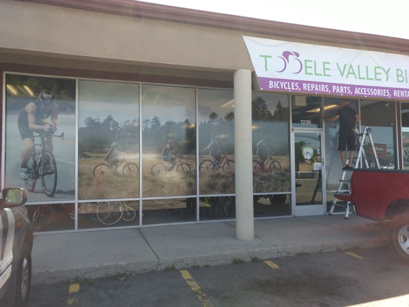 Tooele Valley Bicycle &ndash; Perforated window layout design, production, and installation